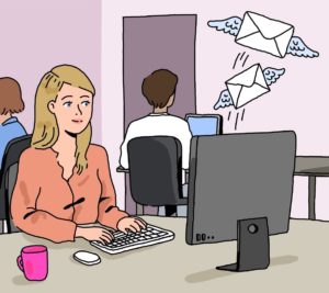 Une employée d'YCID envoi des lettres par mails devant son ordinateur.  
